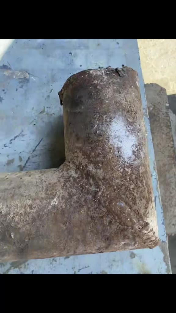 Pipe immersed during a chemical cleaning demonstration